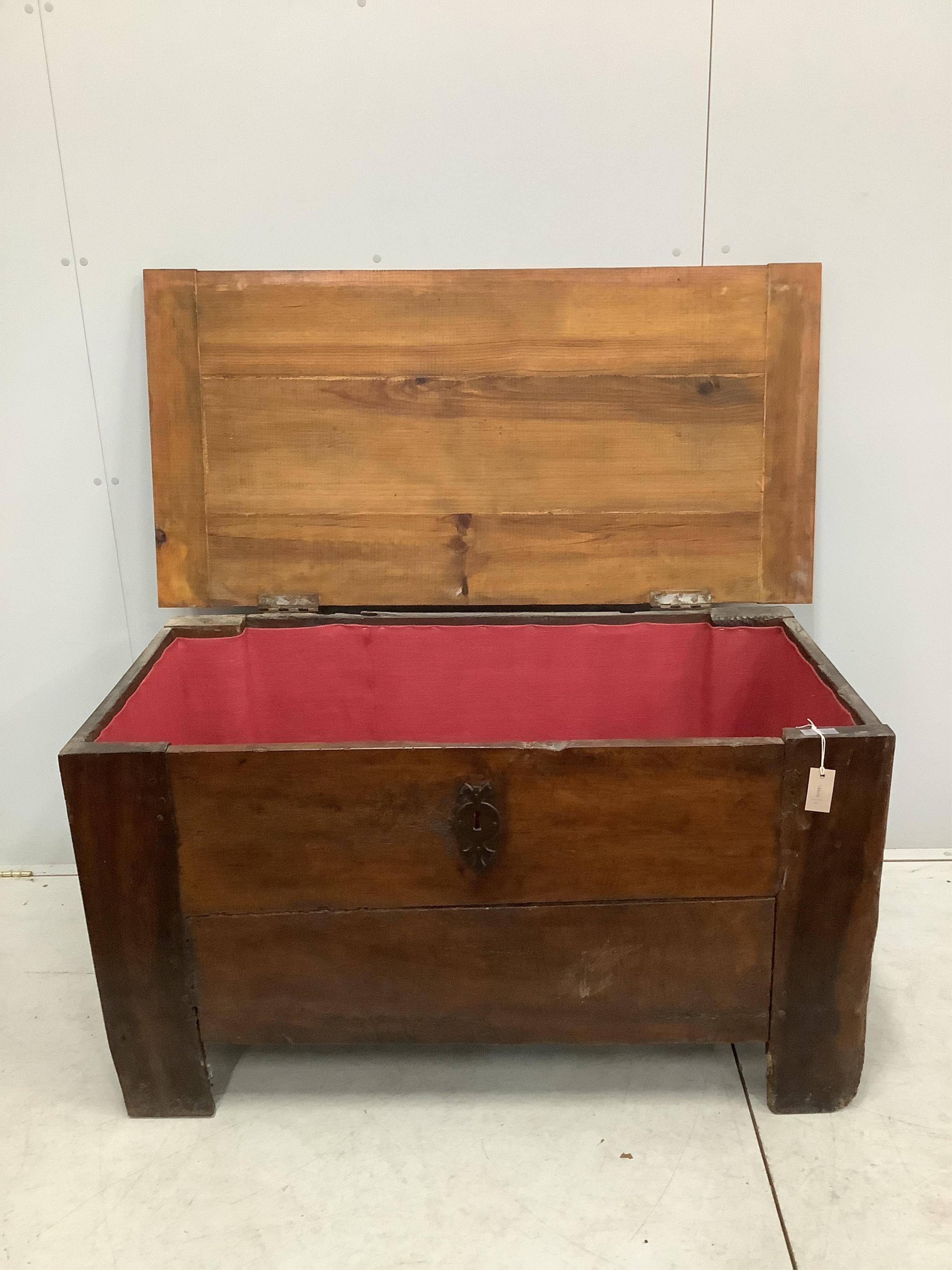 An 18th century and later French oak and fruit wood coffer, width 129cm, depth 65cm, height 71cm. Condition - fair, with later top